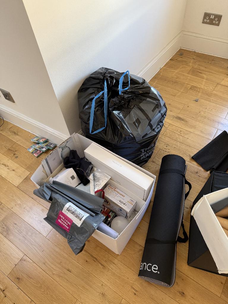 Furniture and household clearance in Twickenham after service with reduced clutter and consolidated bagged items on the floor