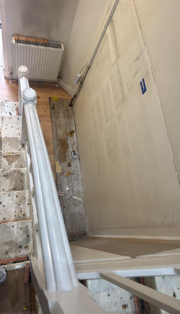 Flat clearance in North Acton - after the clearance shows hallway stairs area cleared of bulky waste