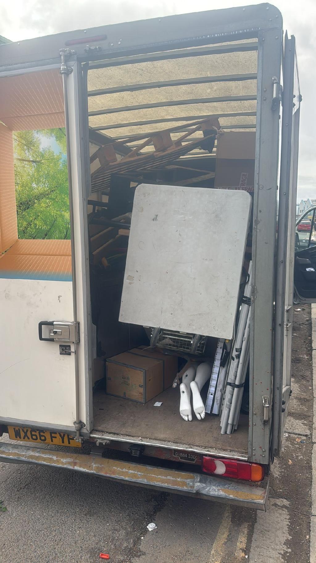 Furniture and bulky item removal in Dollis Hill - after, showing a loaded van with consolidated waste and cleared space readiness