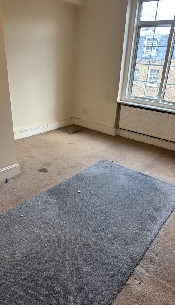 Home renovation waste clearance in Marylebone after clearance shows a cleaner corner room with reduced scattered debris