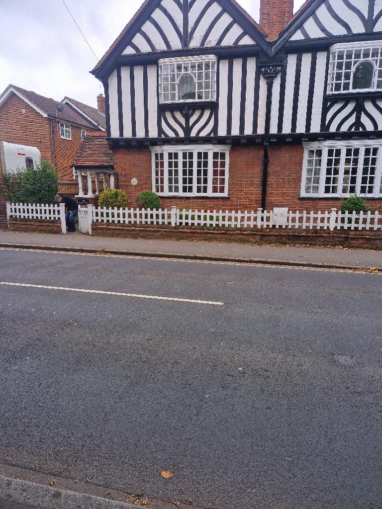 Front garden before clearance in Pinner South, showing the front garden clutter near the fence line