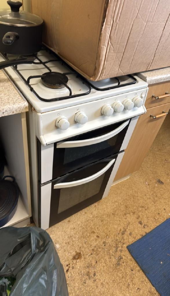 Domestic clutter near the cooker in Wembley Park before household furniture clearance