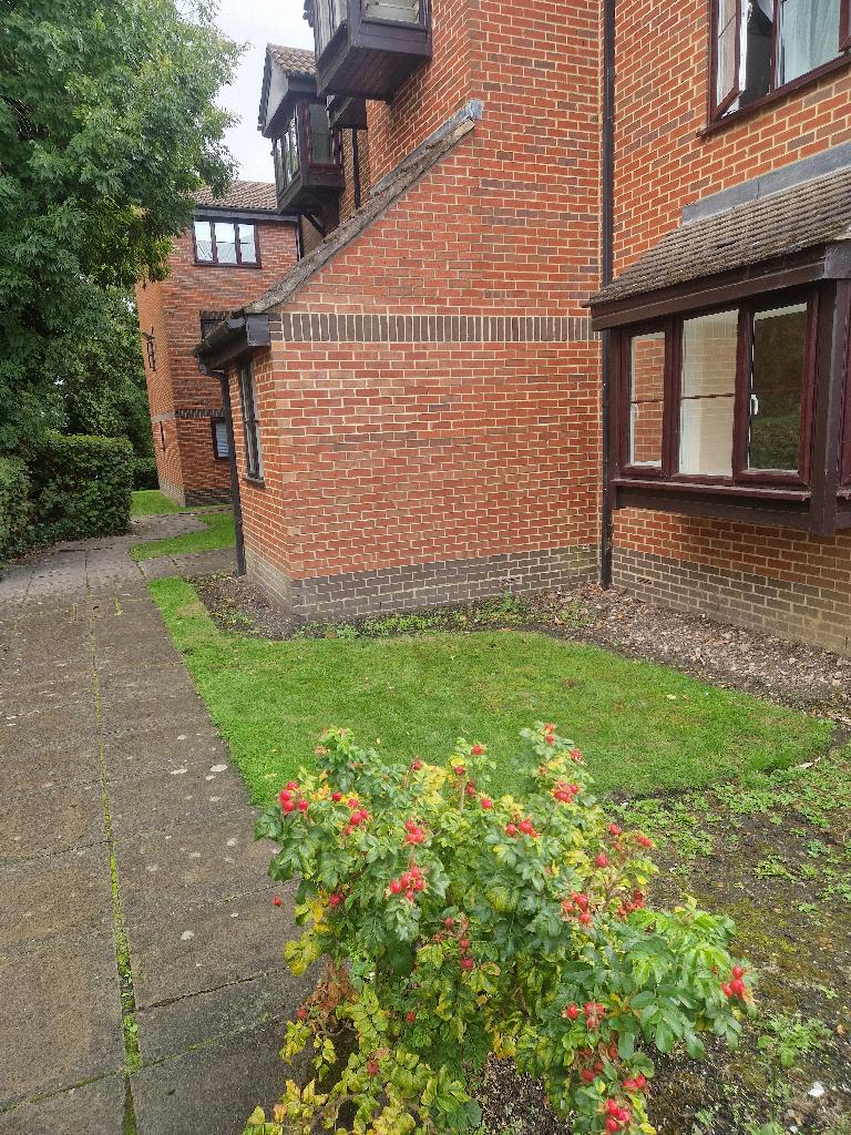 White goods and appliance removal in Enfield - after: mattress and fridge cleared, garden frontage left clean and open