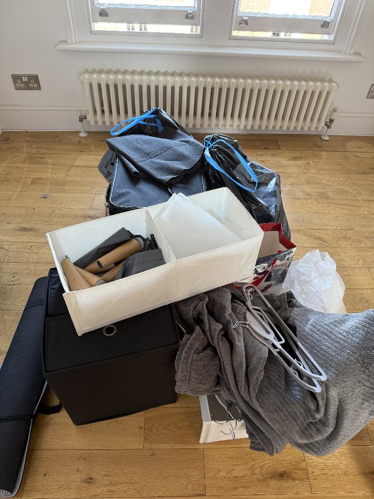 Furniture and household clearance in Twickenham after service showing consolidated items and clearer surrounding flooring