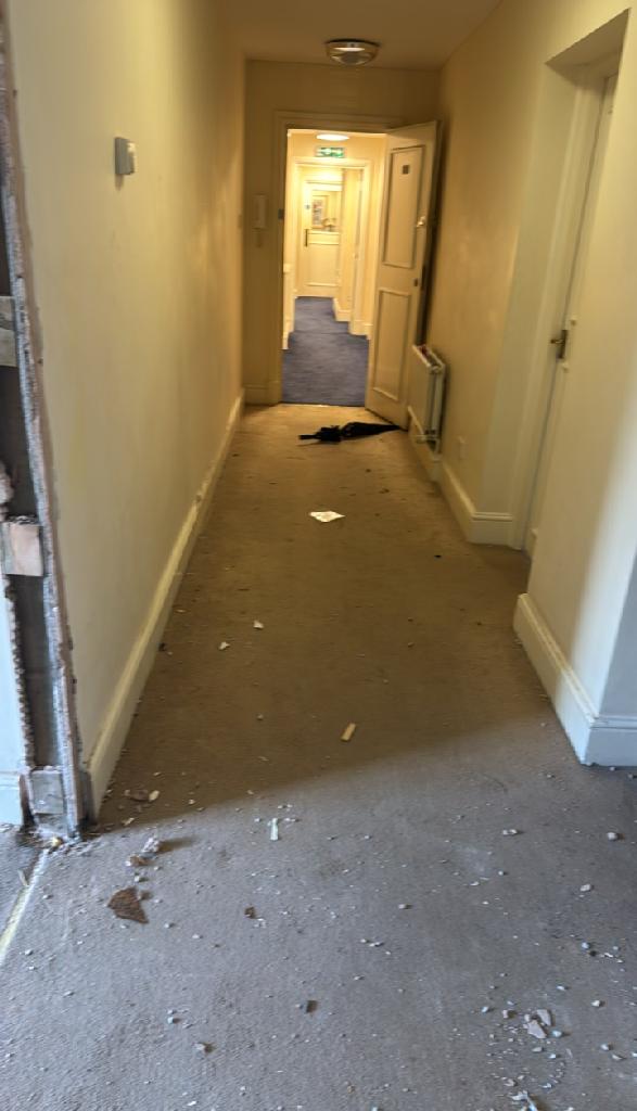 Renovation waste clearance in Marylebone after clearance shows a cleaned hallway with waste cleared from the corridor