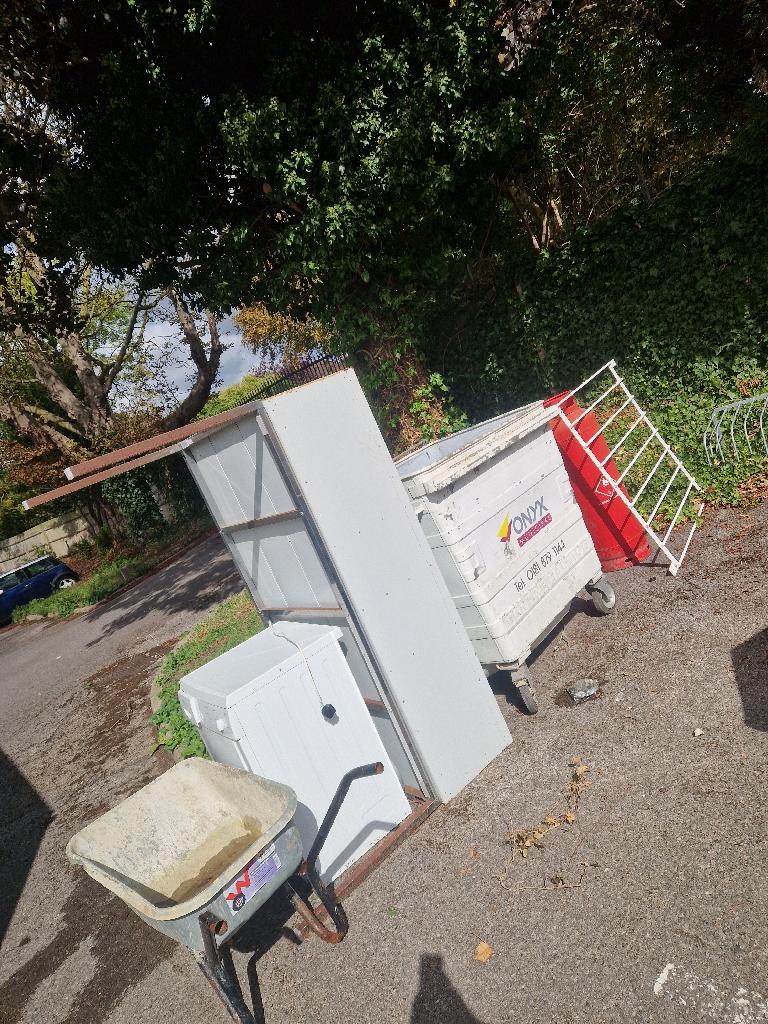 Garden clearance in Thamesfield after the clearance, showing a tidier yard edge with reduced clutter