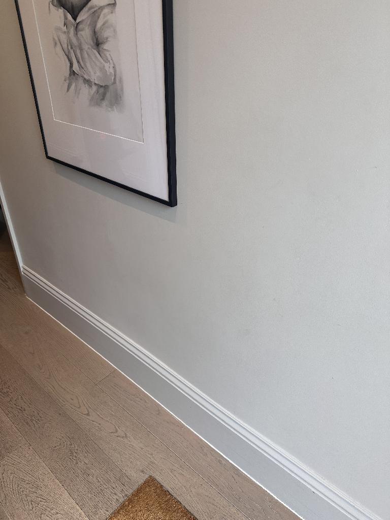 Furniture and bulky item removal in Battersea after service, showing cleared floor space with no remaining mats or equipment
