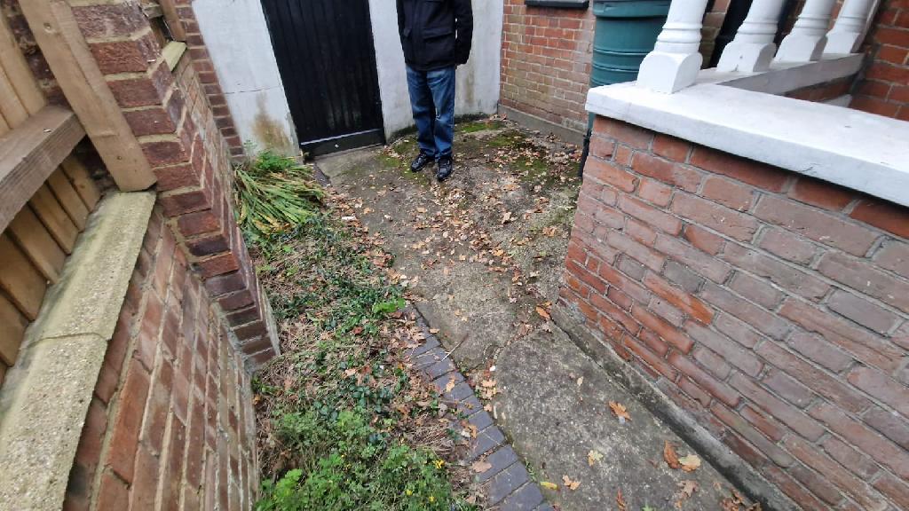 Side passage after clearance in Pinner South, side passage cleared and usable