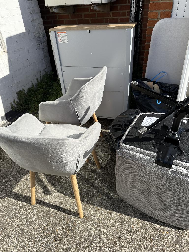Furniture and household clearance in Twickenham before clearance with upholstered chairs and bulky items in the outdoor area