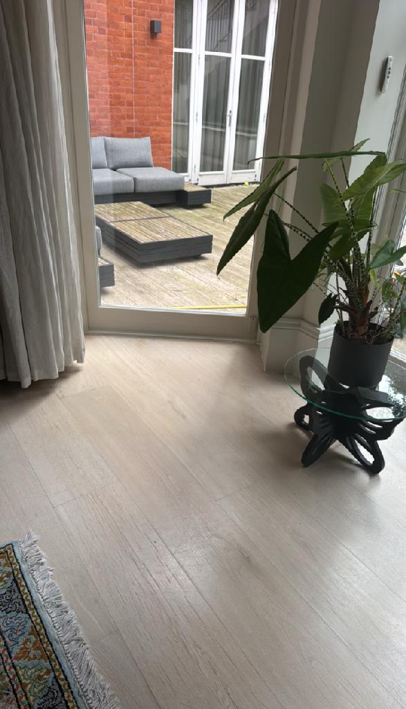 Living room furniture clearance in Hampstead after upholstery clearance left a clear entry route and open floor space