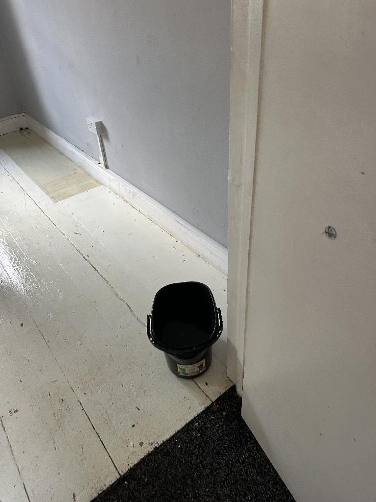 Internal household clearance in Clapham after service, showing a cleared floor corner with waste removed