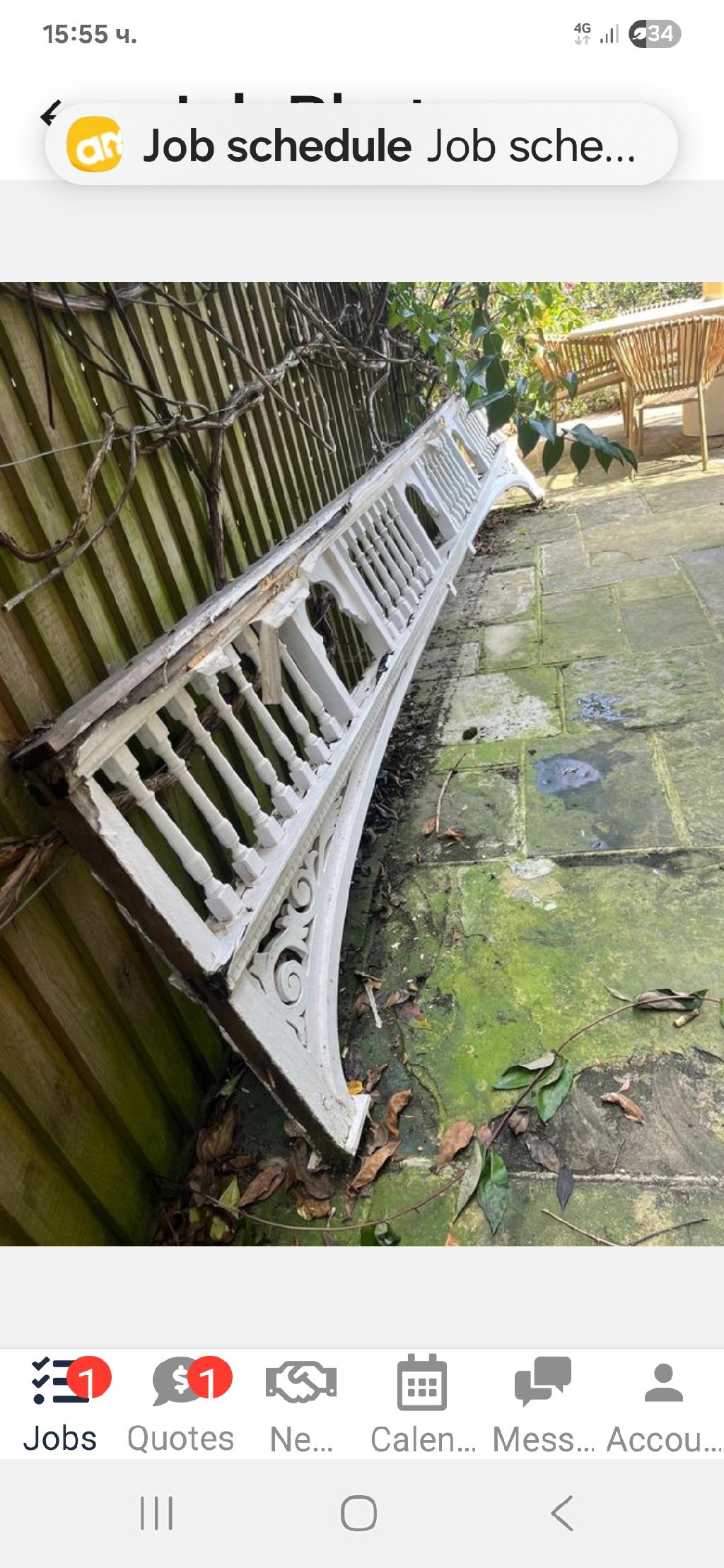 Rubbish removal in Friern Barnet: before image showing scattered garden debris near the paving